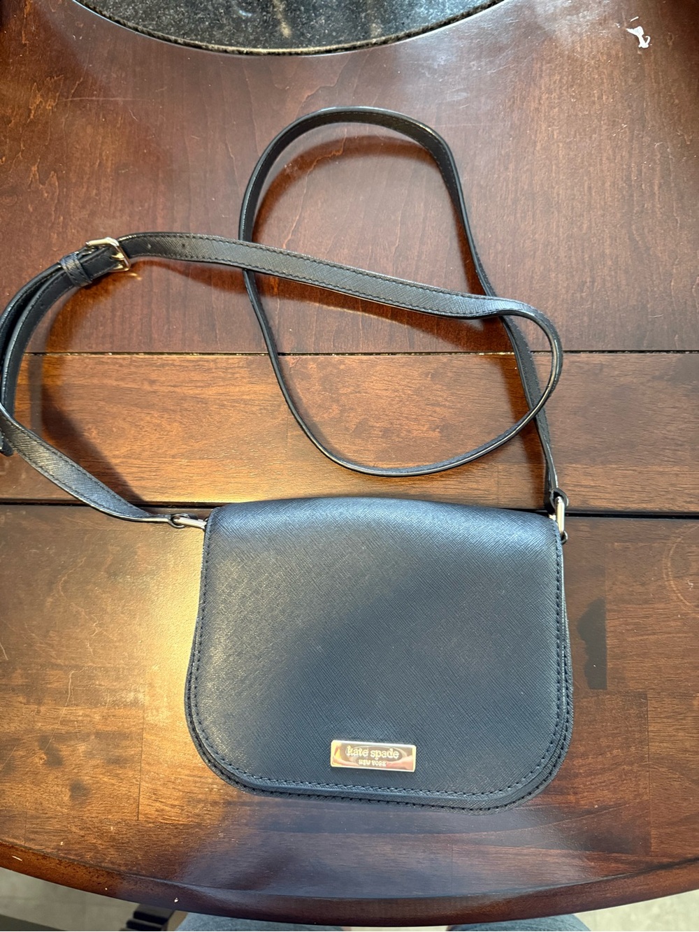 kate spade navy crossbody with gold plaque